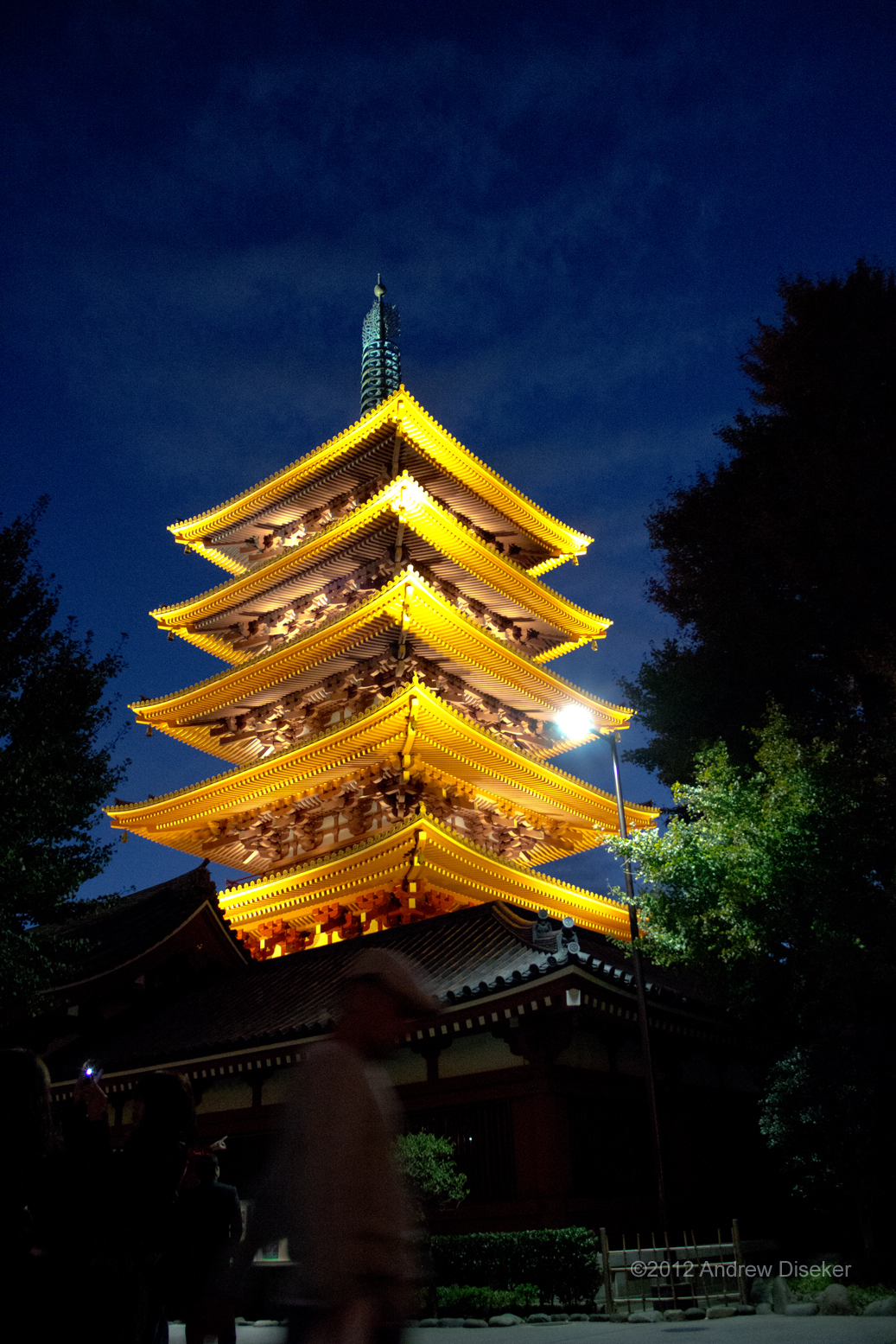 5 story pagoda brightly lit at dusk